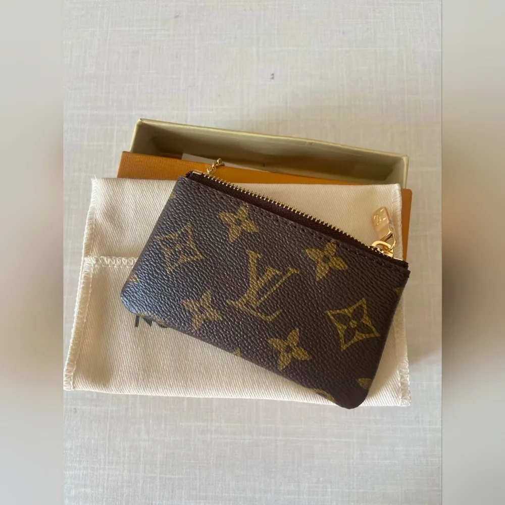 Louis Vuitton Monogram Zipped Key Pouch in Brown with Gold Hardware